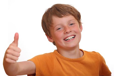 A smiling young boy shows thumbs up Stock Photo - Budget Royalty-Free & Subscription, Code: 400-04398730
