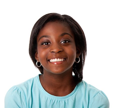 Beautiful smiling face of a happy African teenager girl, isolated. Foto de stock - Super Valor sin royalties y Suscripción, Código: 400-04398788