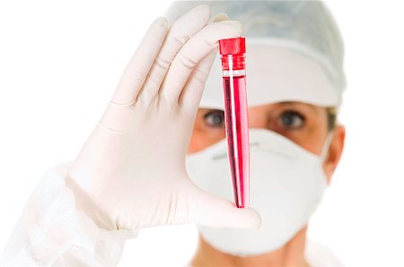 doctor with cap and mask - female doctor with mask holding a test tube Stock Photo - Budget Royalty-Free & Subscription, Code: 400-04398930