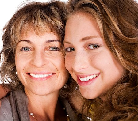 simsearch:400-03972220,k - Close-up of smiling elder mum and daughter facing camera... Fotografie stock - Microstock e Abbonamento, Codice: 400-04398973