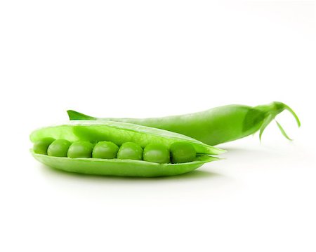 row of seeds - green peas isolated on a white background Stock Photo - Budget Royalty-Free & Subscription, Code: 400-04399315