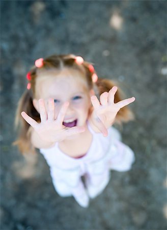 simsearch:400-05342069,k - cute little girl smiling in a park close-up Stock Photo - Budget Royalty-Free & Subscription, Code: 400-04399317