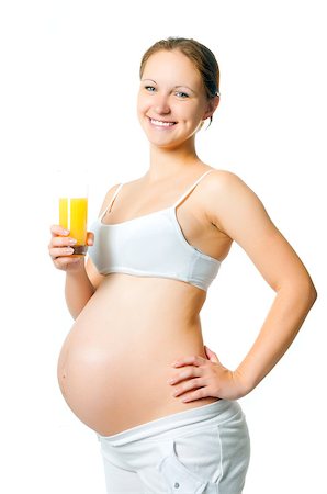 simsearch:400-04416091,k - young pregnant woman with a glass of juice Fotografie stock - Microstock e Abbonamento, Codice: 400-04399326