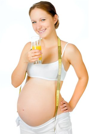 simsearch:400-04416091,k - young pregnant woman with a glass of juice Fotografie stock - Microstock e Abbonamento, Codice: 400-04399327