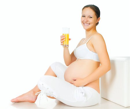 simsearch:400-04416091,k - young pregnant woman with a glass of juice Fotografie stock - Microstock e Abbonamento, Codice: 400-04399329