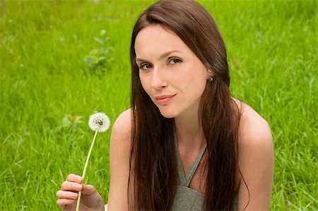 simsearch:400-04107729,k - Girl with dandelion on green field Stock Photo - Budget Royalty-Free & Subscription, Code: 400-04399499