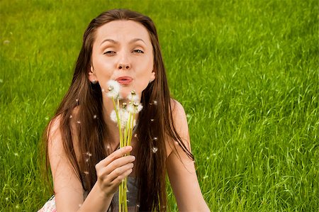 fun park mouth - Girl with dandelion on green field Stock Photo - Budget Royalty-Free & Subscription, Code: 400-04399520