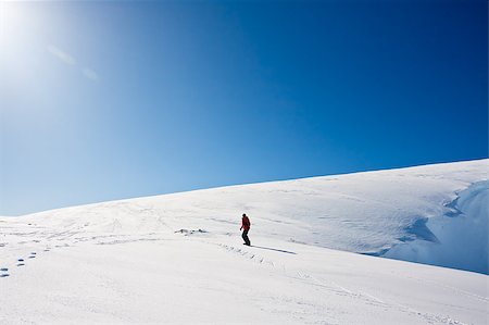 Man moves on snowboard. Glacier in background. Antarctica Stock Photo - Budget Royalty-Free & Subscription, Code: 400-04399576