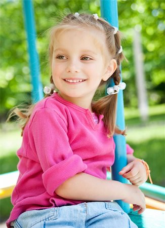 simsearch:400-05342069,k - cute little girl smiling in a park close-up Stock Photo - Budget Royalty-Free & Subscription, Code: 400-04390377