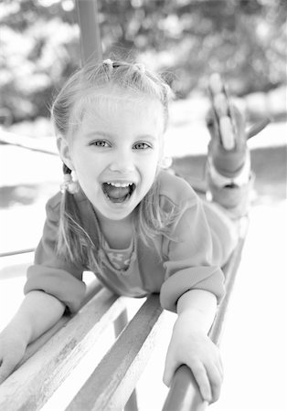 simsearch:400-05342069,k - cute little girl smiling in a park close-up Stock Photo - Budget Royalty-Free & Subscription, Code: 400-04390384