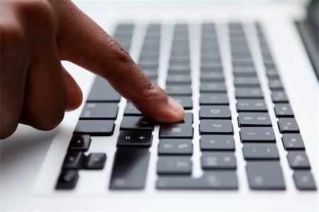 Female finger typing on computer keyboard Stock Photo - Budget Royalty-Free & Subscription, Code: 400-04390633