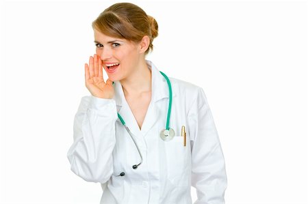 simsearch:400-04351236,k - Smiling medical doctor woman holding her hand near mouth and secretly reporting good news isolated on white Photographie de stock - Aubaine LD & Abonnement, Code: 400-04391108