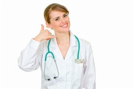 simsearch:400-04351236,k - Smiling medical  female doctor showing contact me gesture isolated on white Photographie de stock - Aubaine LD & Abonnement, Code: 400-04391109