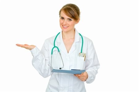 simsearch:400-04351236,k - Smiling doctor woman with medical chart presenting something on empty hand isolated on white Photographie de stock - Aubaine LD & Abonnement, Code: 400-04391113