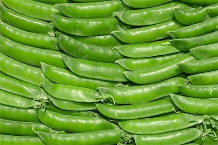 Young green pea pods laid in the rows Stock Photo - Budget Royalty-Free & Subscription, Code: 400-04392196