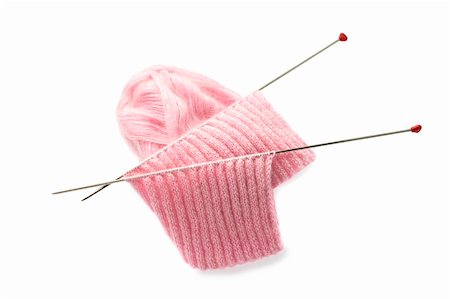 a ball of yarn and needles for knitting and knit pattern isolateg on white Stock Photo - Budget Royalty-Free & Subscription, Code: 400-04392201