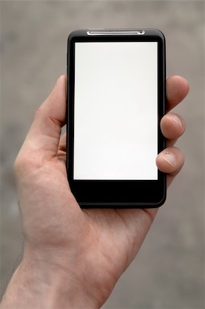 Hand holds a mobile smartphone with a blank screen. You can add any image or text. Stock Photo - Budget Royalty-Free & Subscription, Code: 400-04392361