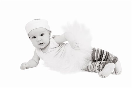 Baby girl wearing a ballet outfit and legwarmers Stock Photo - Budget Royalty-Free & Subscription, Code: 400-04392382