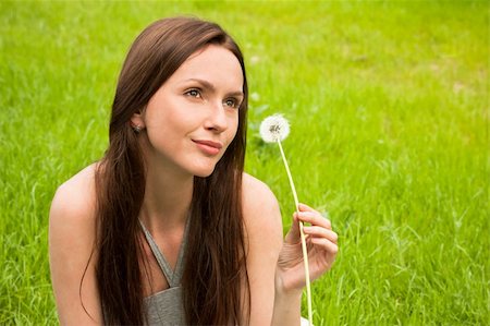 fun park mouth - Girl with dandelion on the green field Stock Photo - Budget Royalty-Free & Subscription, Code: 400-04392828