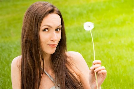 fun park mouth - Girl with dandelion on the green field Stock Photo - Budget Royalty-Free & Subscription, Code: 400-04392829