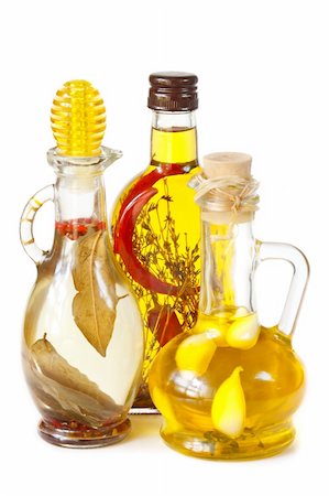 simsearch:400-06479158,k - Spicy olive oil in a glass bottles with herbs for a salad. Stock Photo - Budget Royalty-Free & Subscription, Code: 400-04393587