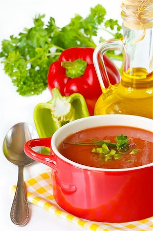 simsearch:825-02307790,k - Tomato soup in a red ceramic saucepan and vegetables. Photographie de stock - Aubaine LD & Abonnement, Code: 400-04393659