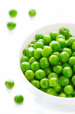 Fresh green peas in a white ceramic bowl. Stock Photo - Budget Royalty-Free & Subscription, Code: 400-04393668