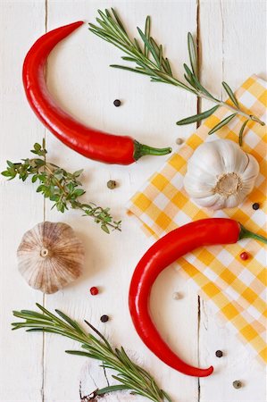 simsearch:400-04846756,k - Chili, garlic and herbs on a white wooden board. Stock Photo - Budget Royalty-Free & Subscription, Code: 400-04393859
