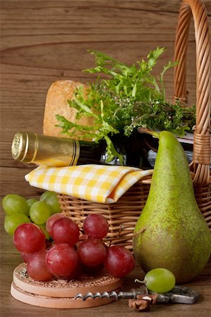 endives cook - Wine, bread and herbs in a wicker basket, grapes and pear for picnic. Stock Photo - Budget Royalty-Free & Subscription, Code: 400-04393885
