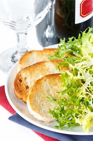 endives cook - Crusty toasts, bottle of red wine and endive salad. Stock Photo - Budget Royalty-Free & Subscription, Code: 400-04393927