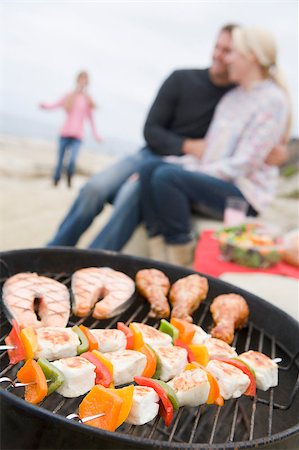 shrimp kabob - Couple Cooking On A Barbeque Stock Photo - Budget Royalty-Free & Subscription, Code: 400-04404182