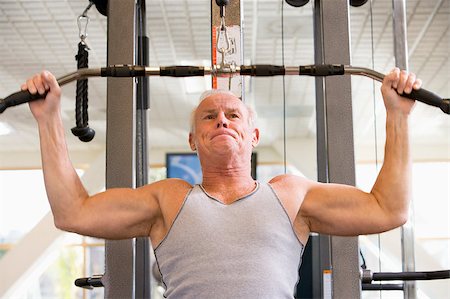 Man Weight Training At Gym Stock Photo - Budget Royalty-Free & Subscription, Code: 400-04404285