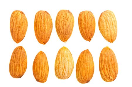 simsearch:400-04290468,k - Almond nuts isolated on white background Foto de stock - Super Valor sin royalties y Suscripción, Código: 400-04404676