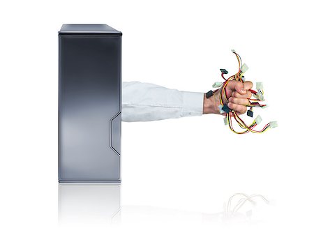 plug in with hand - An arm dressed in a business shirt bursts from the side of a PC case with a handful of internal power cables. Stock Photo - Budget Royalty-Free & Subscription, Code: 400-04404914