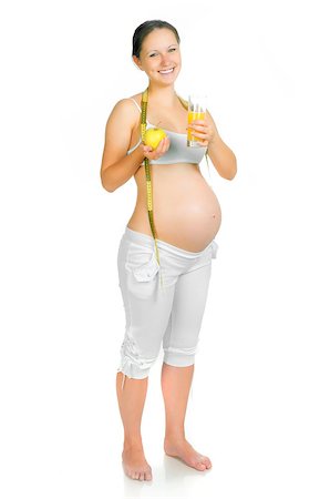 simsearch:400-04416091,k - young pregnant woman with a glass of juice Fotografie stock - Microstock e Abbonamento, Codice: 400-04405195
