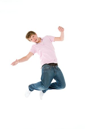 simsearch:400-04405553,k - Teenage Boy Jumping In The Air Stock Photo - Budget Royalty-Free & Subscription, Code: 400-04405688