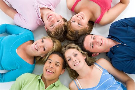 Teenagers Lying Down Head To Head Stock Photo - Budget Royalty-Free & Subscription, Code: 400-04405704