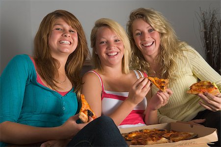 pizza tv - Teenage Girls Eating Pizza Stock Photo - Budget Royalty-Free & Subscription, Code: 400-04405744