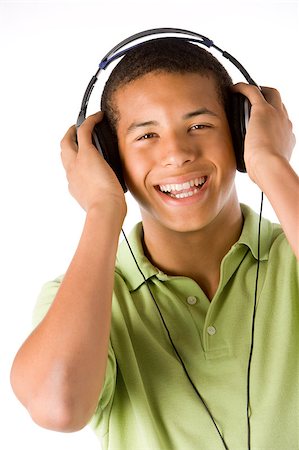 simsearch:400-04405553,k - Teenage Boy Listening To Music On Headphones Stock Photo - Budget Royalty-Free & Subscription, Code: 400-04405812