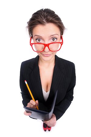 funny looking girls with glasses - A picture of a young funny secretary taking notes over white background Stock Photo - Budget Royalty-Free & Subscription, Code: 400-04406189