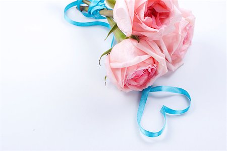 simsearch:400-06630484,k - A bouquet of roses with ribbon in heart shape Stock Photo - Budget Royalty-Free & Subscription, Code: 400-04406535