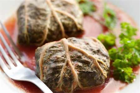 simsearch:400-04055000,k - Rustic food, armenian or greek dolmades wrapped with rhubarb leaves, meat and rice Photographie de stock - Aubaine LD & Abonnement, Code: 400-04406649