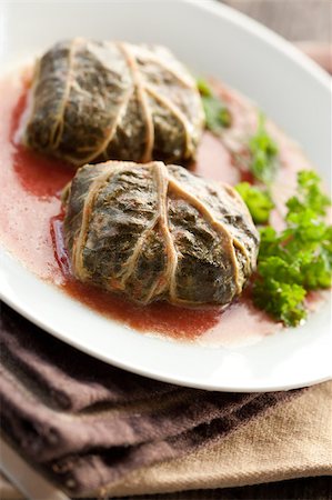 simsearch:400-04055000,k - Rustic food, armenian or greek dolmades wrapped with rhubarb leaves, meat and rice Photographie de stock - Aubaine LD & Abonnement, Code: 400-04406652
