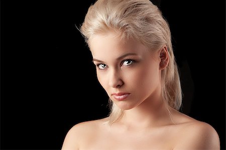 simsearch:400-05744994,k - beauty closeup portrait of a young woman blonde woman looking straight into the camera Stock Photo - Budget Royalty-Free & Subscription, Code: 400-04407158
