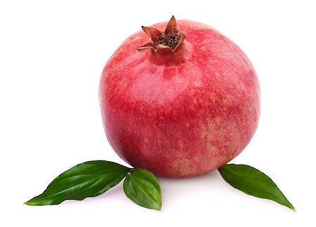 simsearch:693-08127360,k - Juicy pomegranate with leaves. Isolated on a white background Photographie de stock - Aubaine LD & Abonnement, Code: 400-04408143