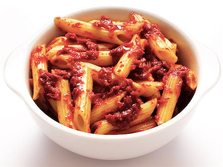 bowl of penne pasta in tomato sauce Photographie de stock - Aubaine LD & Abonnement, Code: 400-04409514