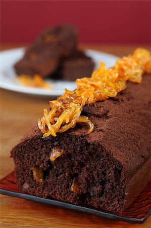 peau d'orange - Chocolate cake with candied orange peel. Shallow dof Photographie de stock - Aubaine LD & Abonnement, Code: 400-04400000