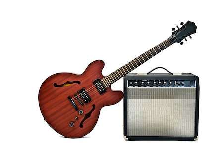 simsearch:400-08572683,k - electric guitar leaning on a small amplifier Stock Photo - Budget Royalty-Free & Subscription, Code: 400-04400099