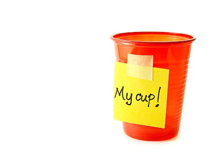 Red party cup with a sign isolated on a white background Photographie de stock - Aubaine LD & Abonnement, Code: 400-04401277