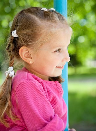 simsearch:400-05342069,k - cute little girl smiling in a park close-up Stock Photo - Budget Royalty-Free & Subscription, Code: 400-04401343